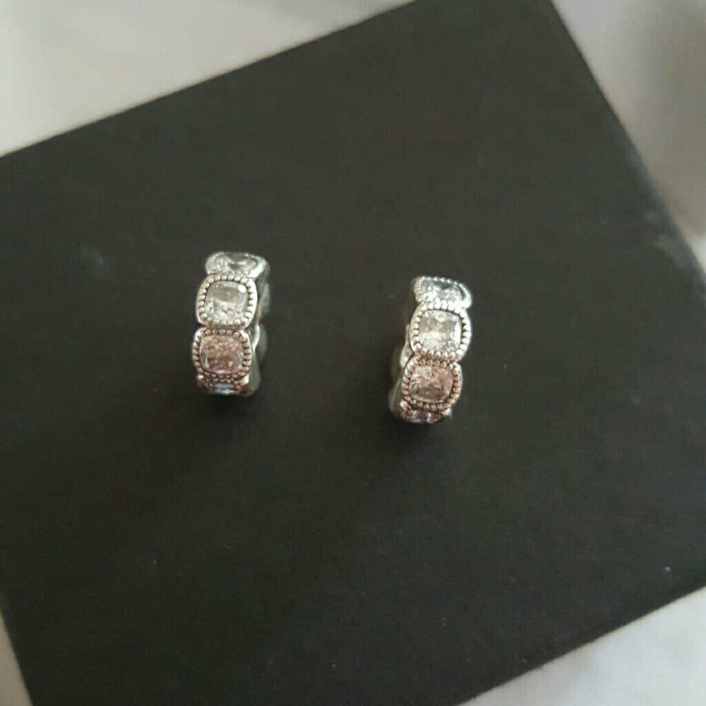 Authentic Pandora spacers with clear CZ.